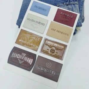 Leather patches sewn onto clothes men’s jeans embossed with metal letters leather metal tags